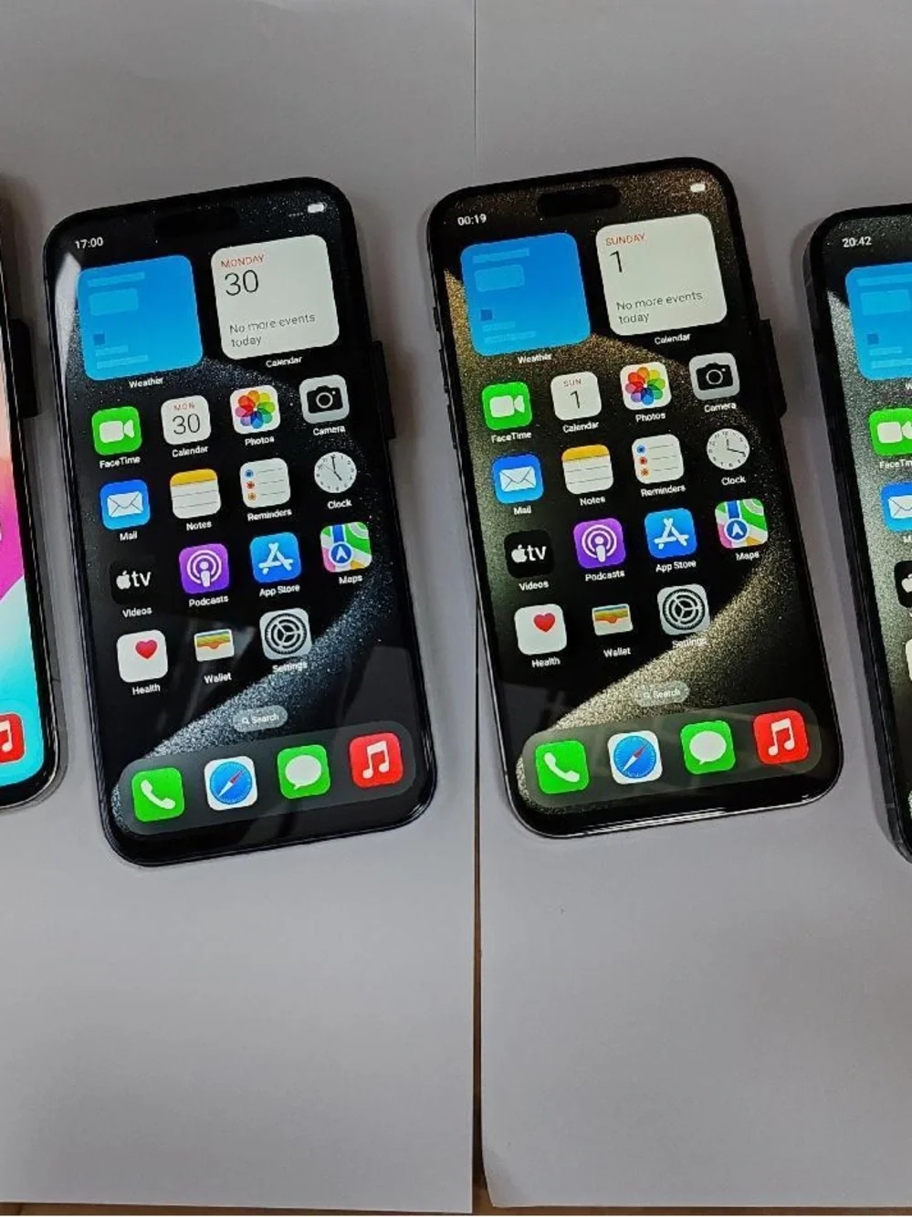 Apple iPhone (All Colors) with Red-Blue Display and White USB-C Cable